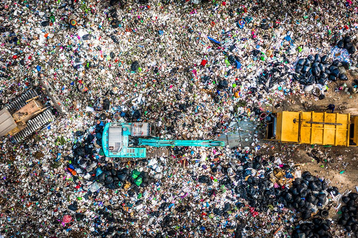 Aerial view of a municipal landfill with leachate collection infrastructure — PFAS contamination from landfill leachate threatens groundwater supplies
