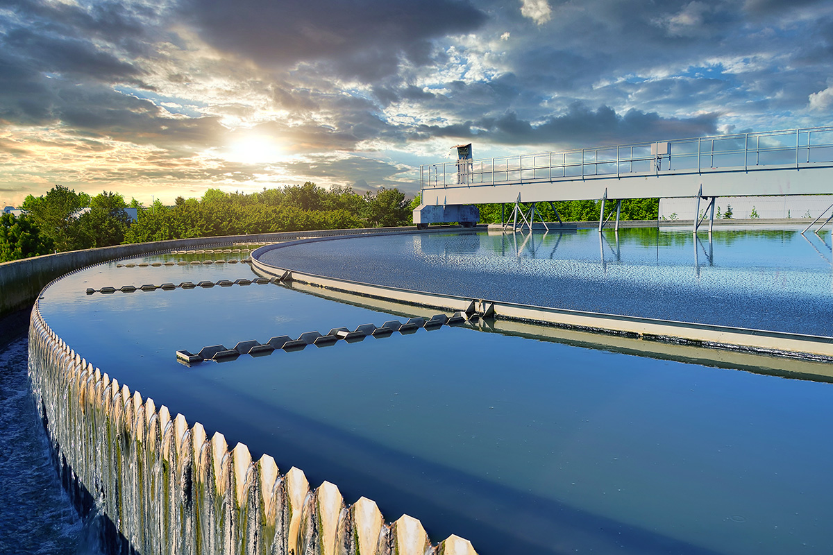 Circular clarification tank at a modern urban wastewater treatment plant — state NPDES permits are increasingly including PFAS discharge limits for treatment facilities